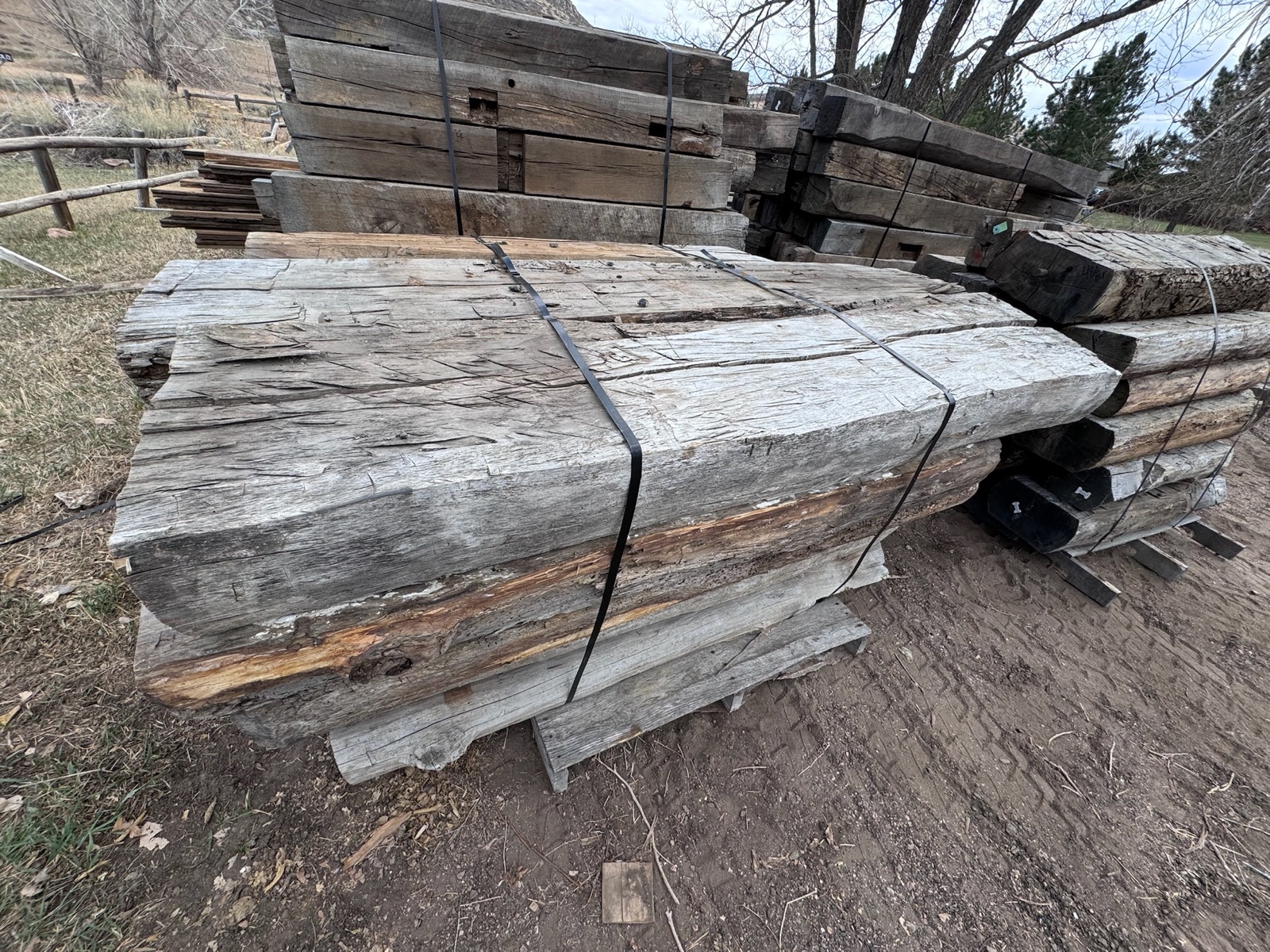 Strapped and bundled reclaimed lumber on pallet, ready for transport