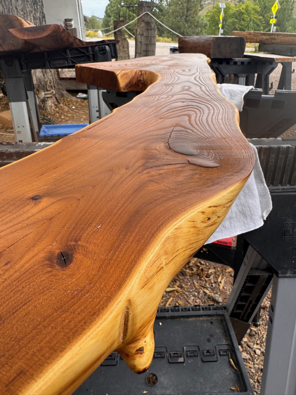Live-edge slab being finished at the mill